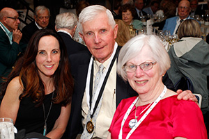 John T. Mitchell ’67 & ’94P, Sara Mitchell ’94P, and their daughter Margaret L. Moore ’94
